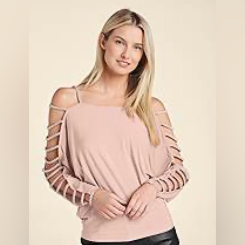 It’s all about the bling. Show off your toned arms in this fabulous date top!